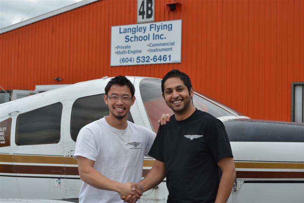 Jojhar Gill receives congrats from his Flight Instructor, Nam Vue , after the successful completion of Jo's First Solo Flight on June 30, 2011.  Langley Flying School.